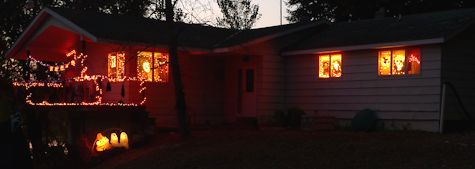 our house with lights at night